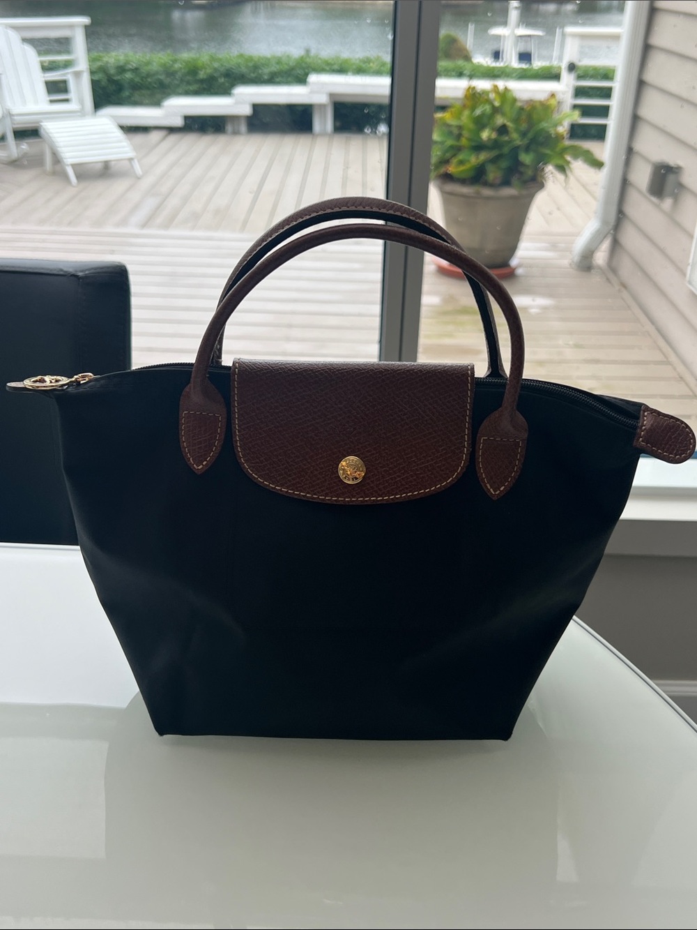 Longchamp Black Tote with Brown Leather Trim (12” height 9” wide)
